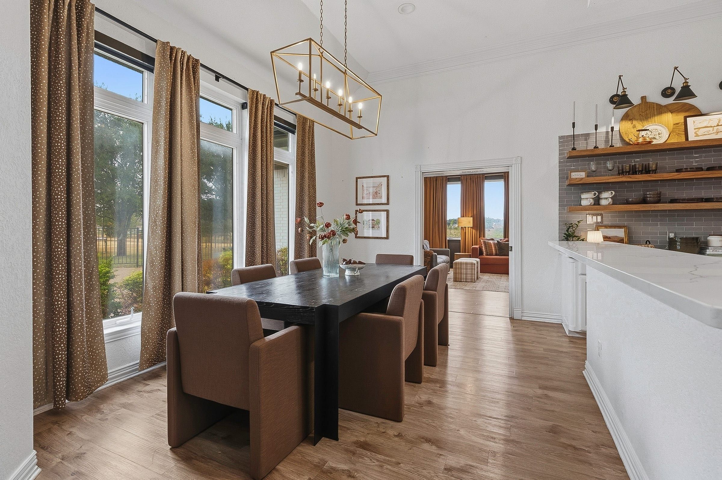 Dining area with gold chandelier