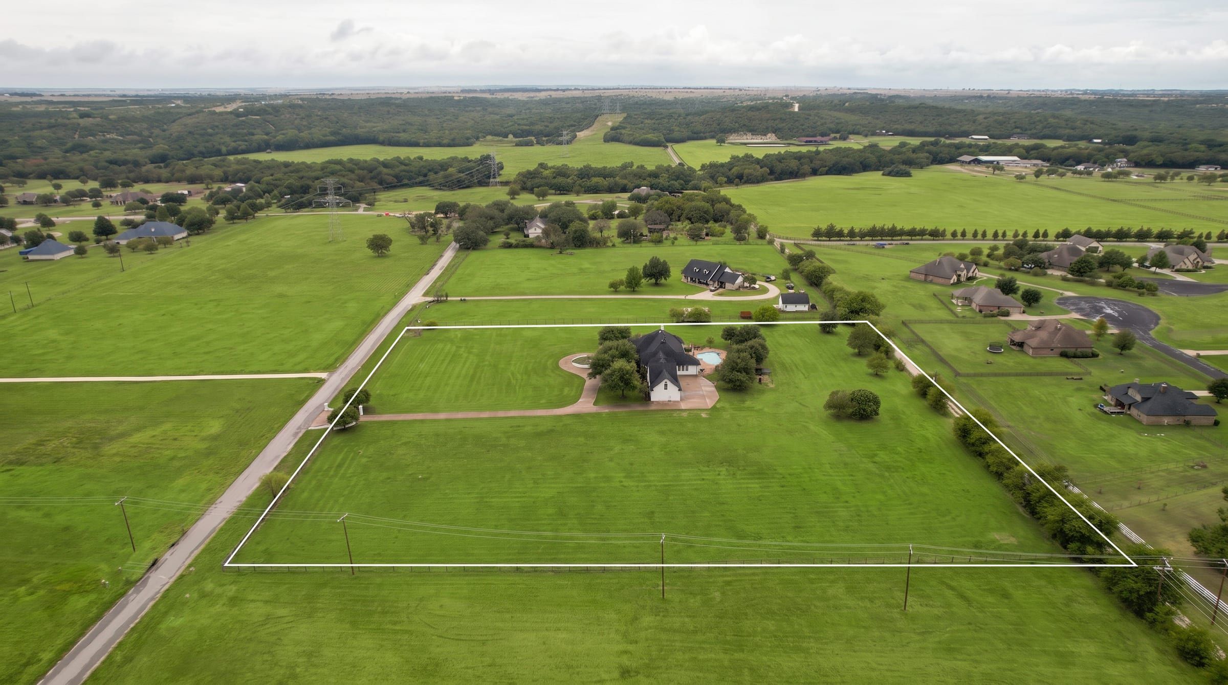 Aerial view of the property boundary along the road