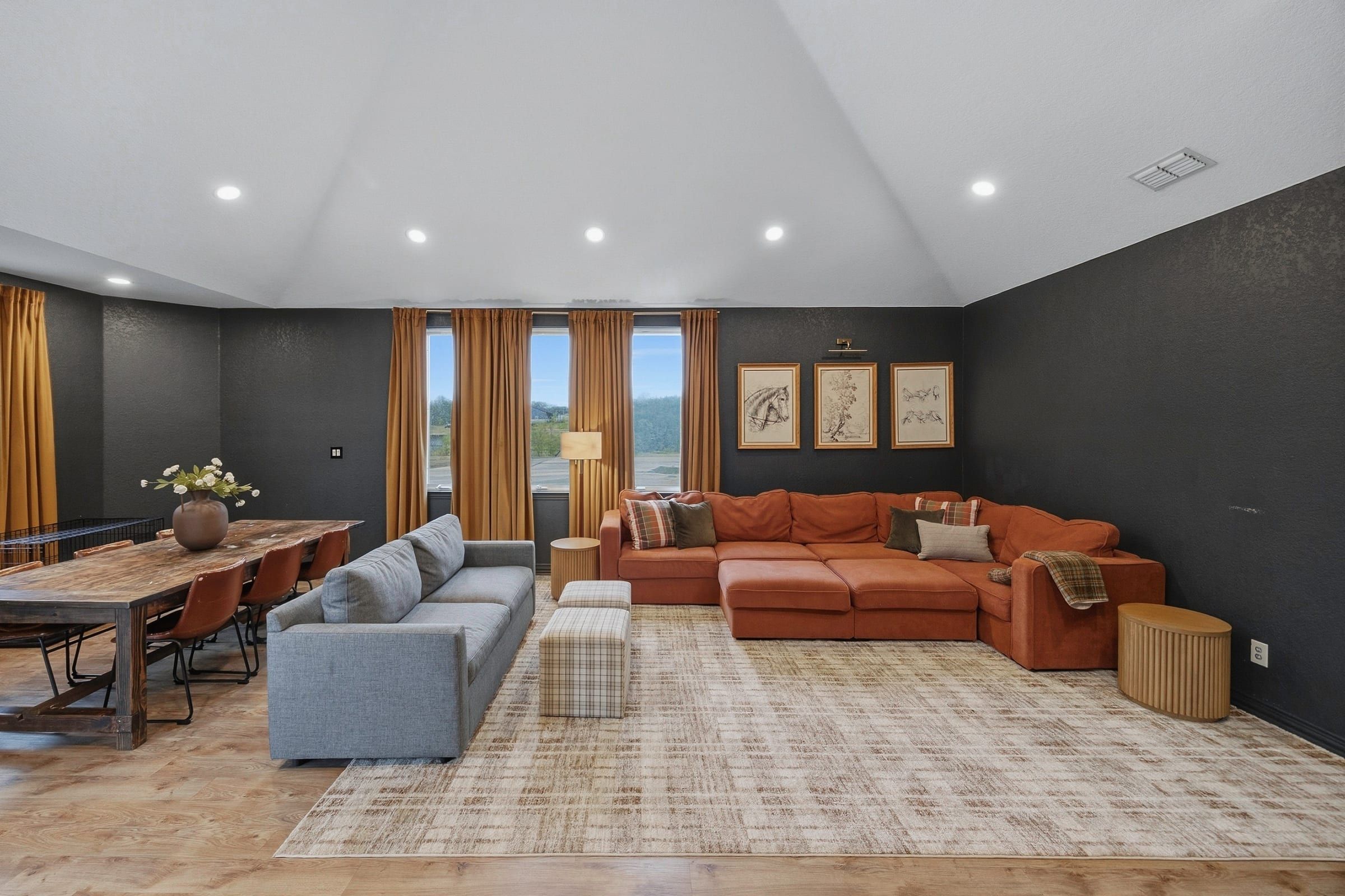 Game room with seating area and large table, room for a full pool table
