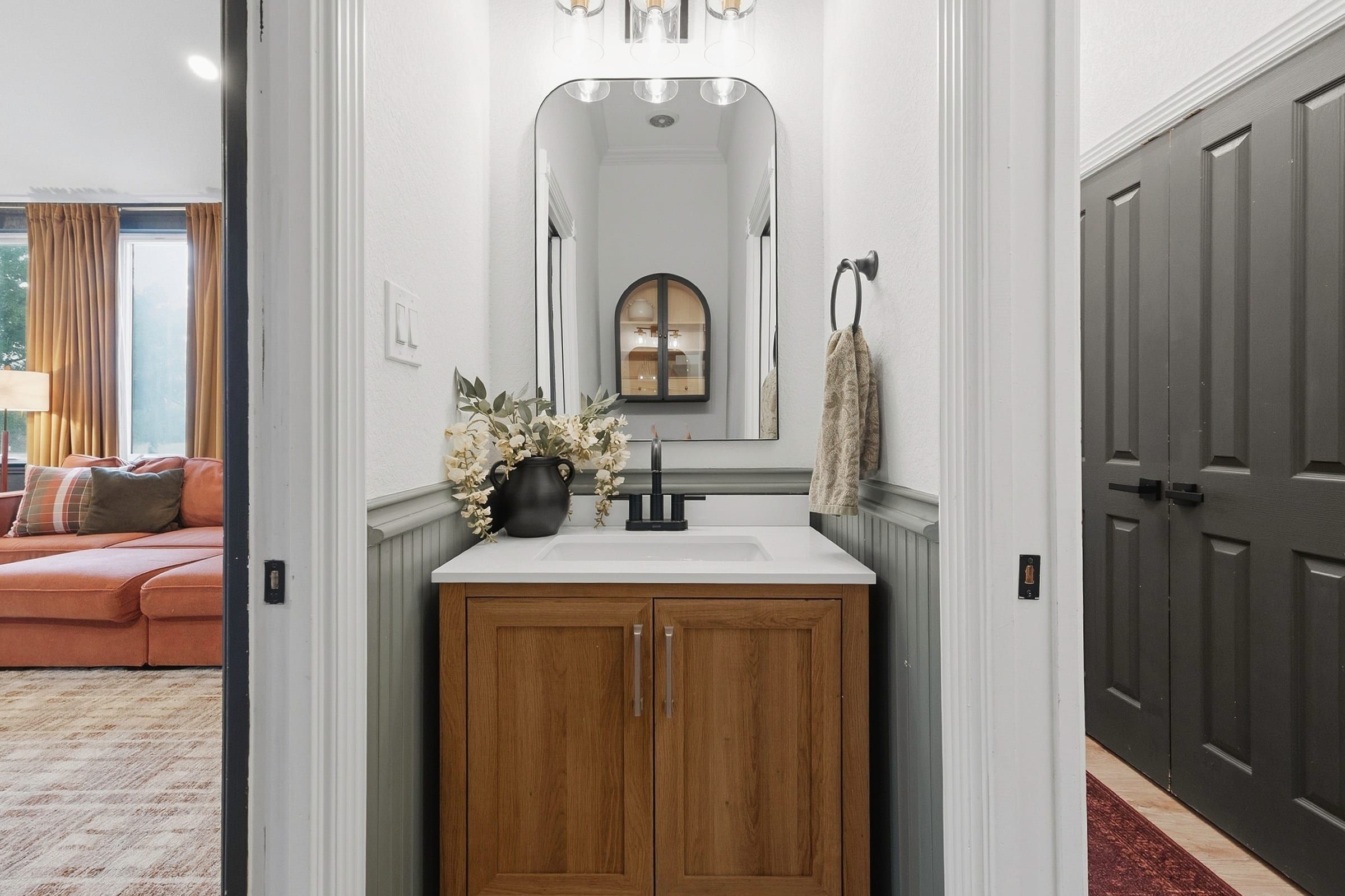 Updated half bath with wood vanity